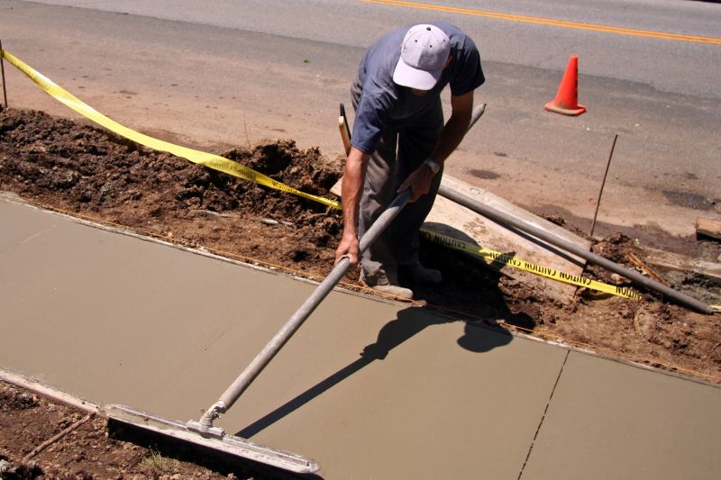 Local Concrete Sidewalk Replacement pros at work